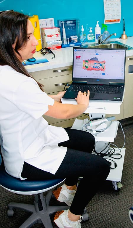 A dentist reviewing restorative dentistry options with a patient.