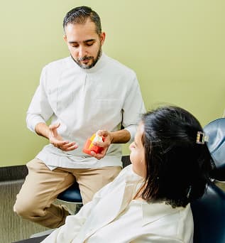 A Dapto dentist discussing dental implant planning.