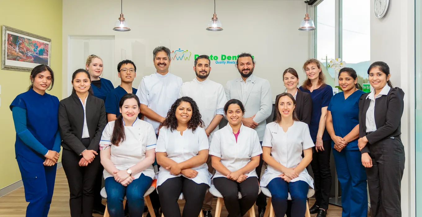The Dapto Dentists team standing together in the clinic.